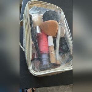 Clear Makeup Bag with Assorted Cosmetics